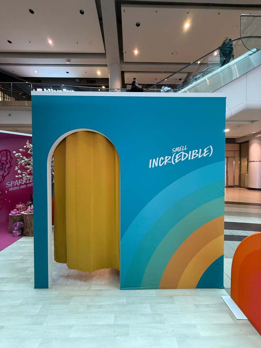 LUSH Pop-Up — playful yellow archway activation